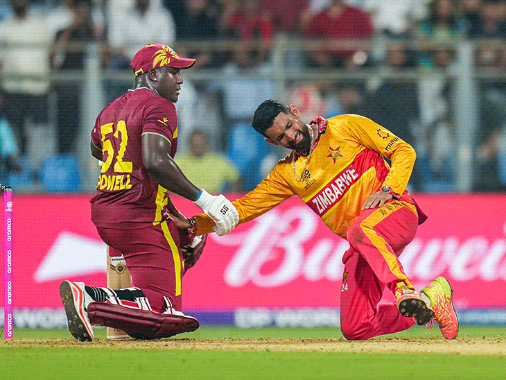 टी 20 वर्ल्डकप मैच में सबसे ज्यादा छक्कों का रिकॉर्ड बना:पॉवेल ने सिकंदर रजा का माथा चूमा, हेटमायर ने 108 मीटर का सिक्स लगाया